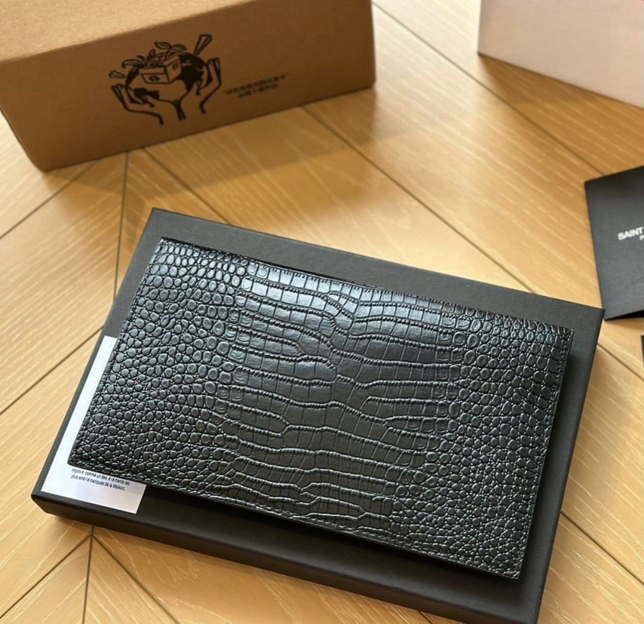 YSL uptown pouch in crocodile-embossed shiny leather