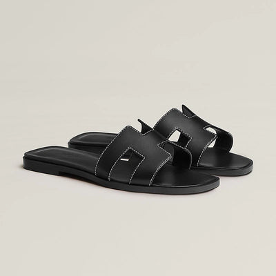 Hermes Black Oran Sandals With White Stiches hover