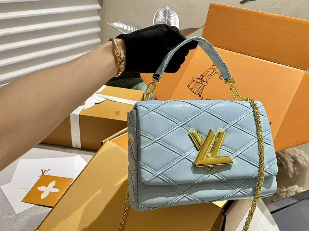 Louis Vuitton GO-14 MM Handbag in blue with quilted leather and gold-tone hardware