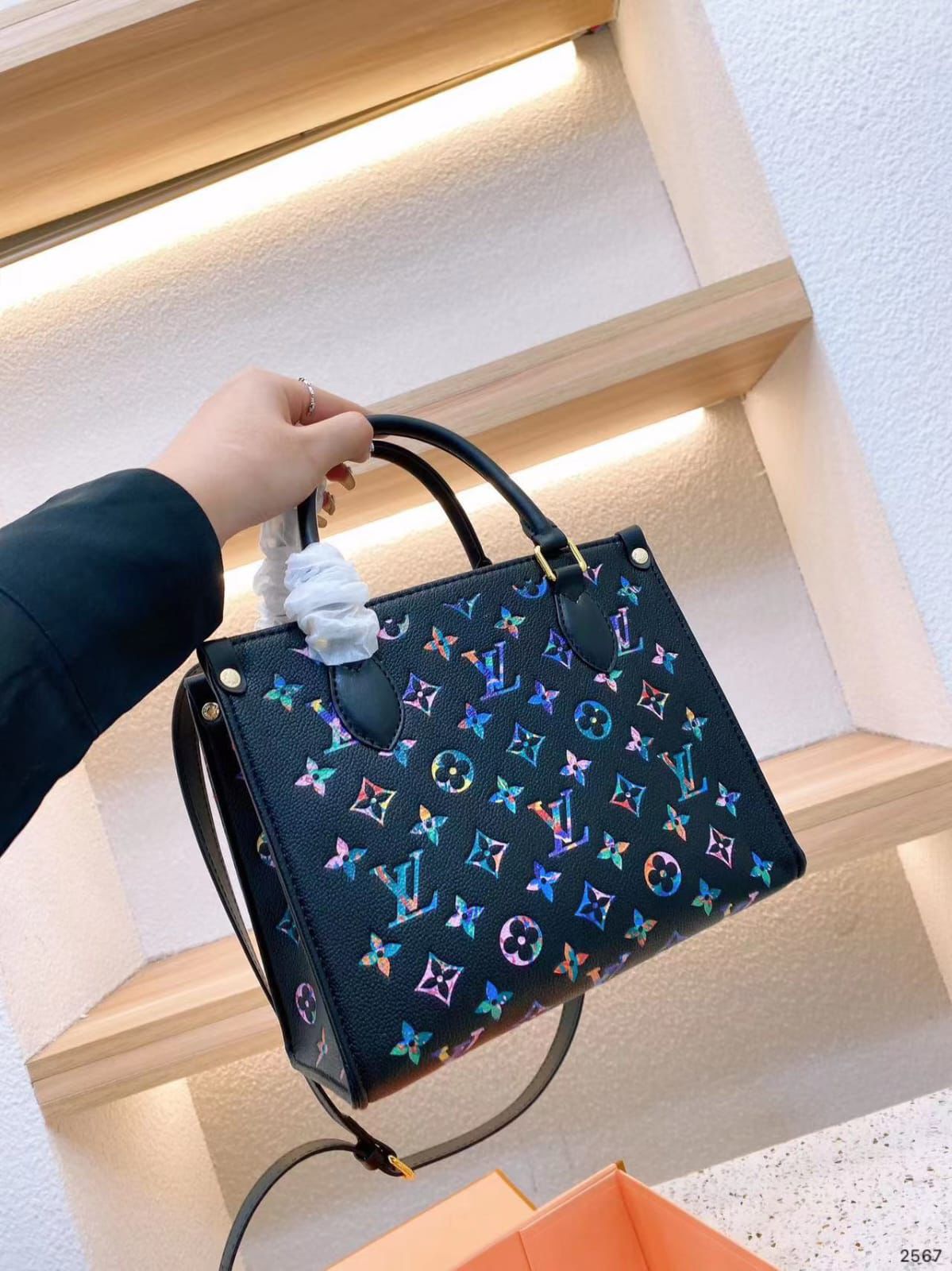 Front view of Louis Vuitton OnTheGo Rainbow Tote with colorful monogram canvas