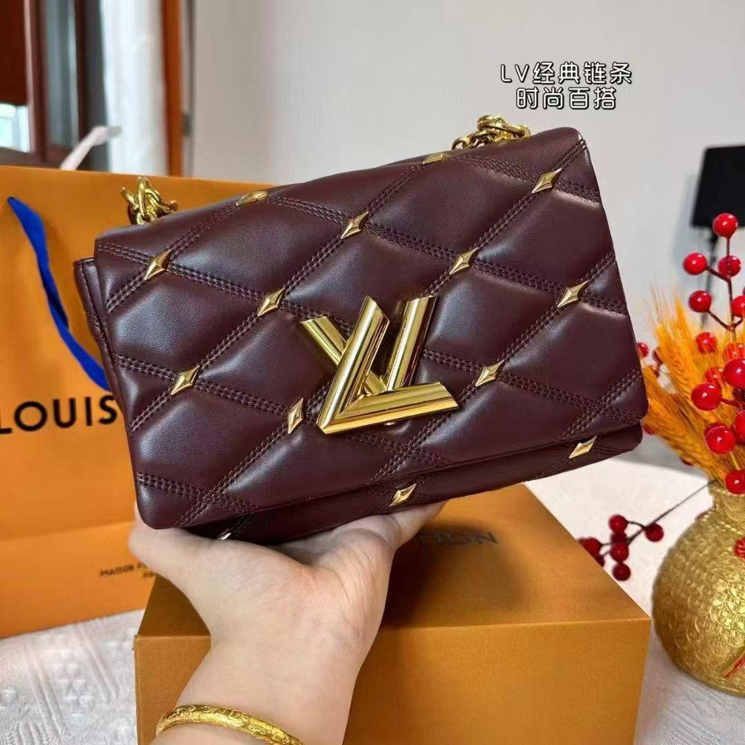 Dark brown GO-14 MM handbag by Louis Vuitton in soft leather with monogram detail