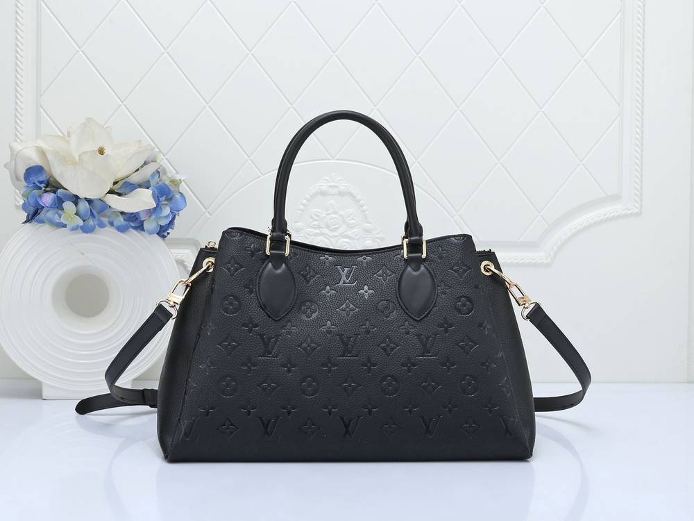 Classic black Louis Vuitton Vendôme MM handbag featuring structured silhouette and leather finish
