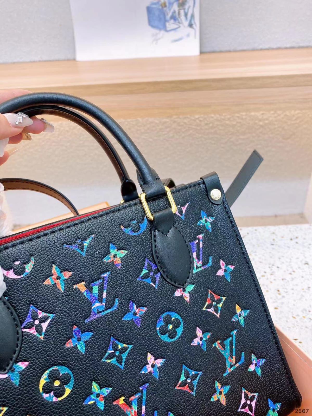 Interior view of Louis Vuitton OnTheGo Rainbow Tote with spacious compartments