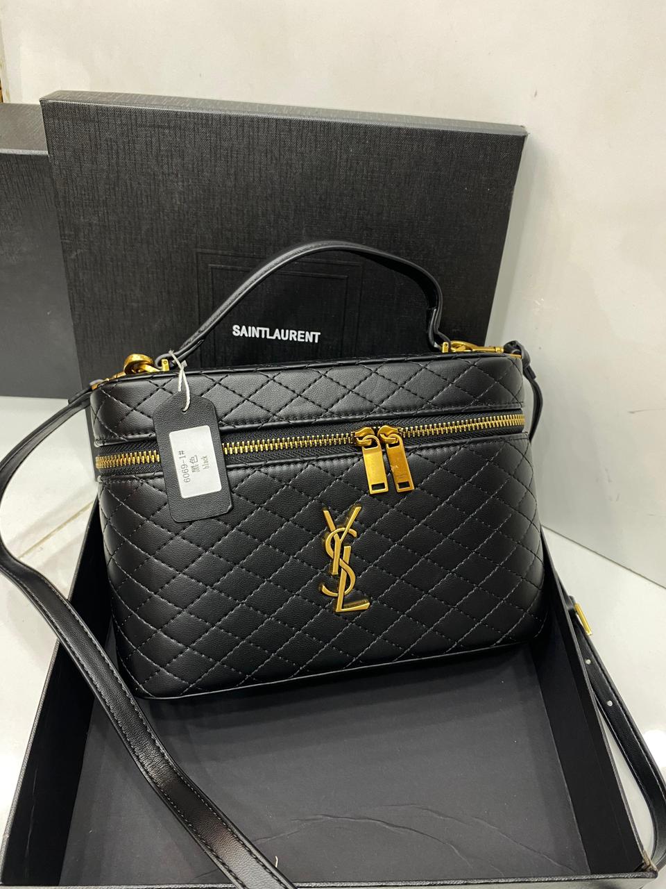 Front view of Saint Laurent GABY vanity bag in lambskin – elegant women’s designer handbag with quilted leather and YSL logo.