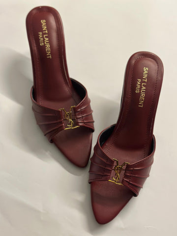 Front view of YSL Garnet Charm Pointed Heels – elegant pointed-toe designer heels in deep garnet red with sleek leather finish.