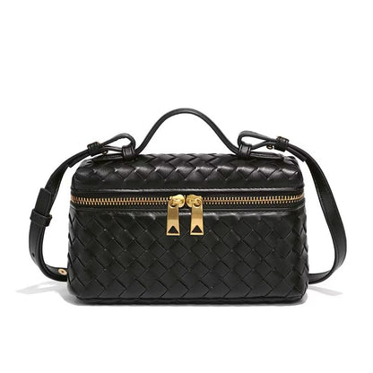 BOTTEGA VENETA*
Bang Bang Intrecciato leather vanity case