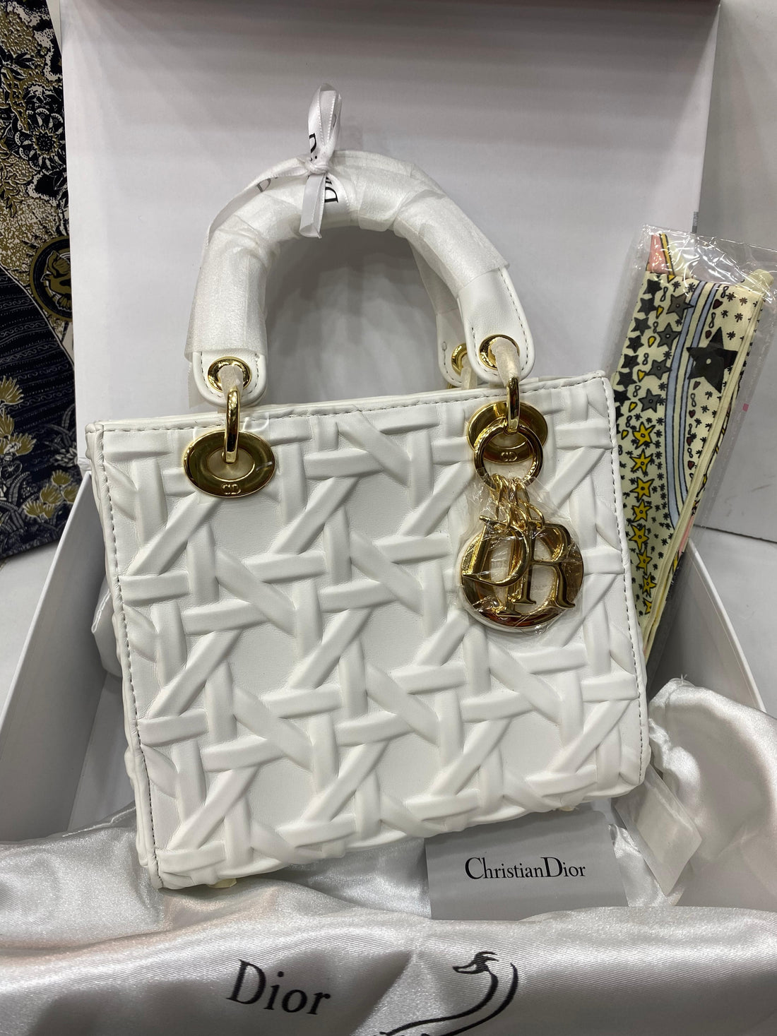 Medium Lady Christian Dior Bag in black Cannage lambskin.
