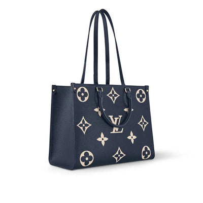 Louis Vuitton OnTheGo MM Bicolor Monogram Empreinte Leather hover