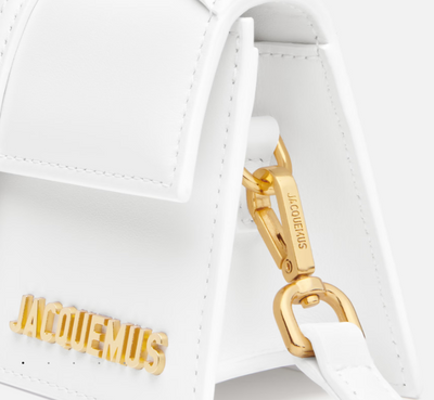 The Bambino Small handbag with adjustable crossbody strap. hover