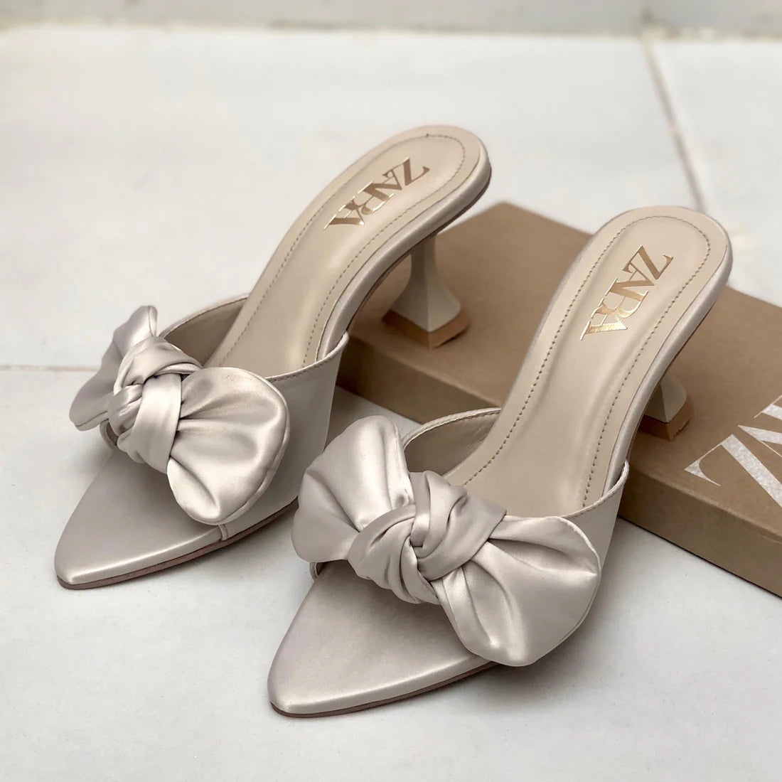 Zara Bow Heels Women’s Footwear (silver/white)