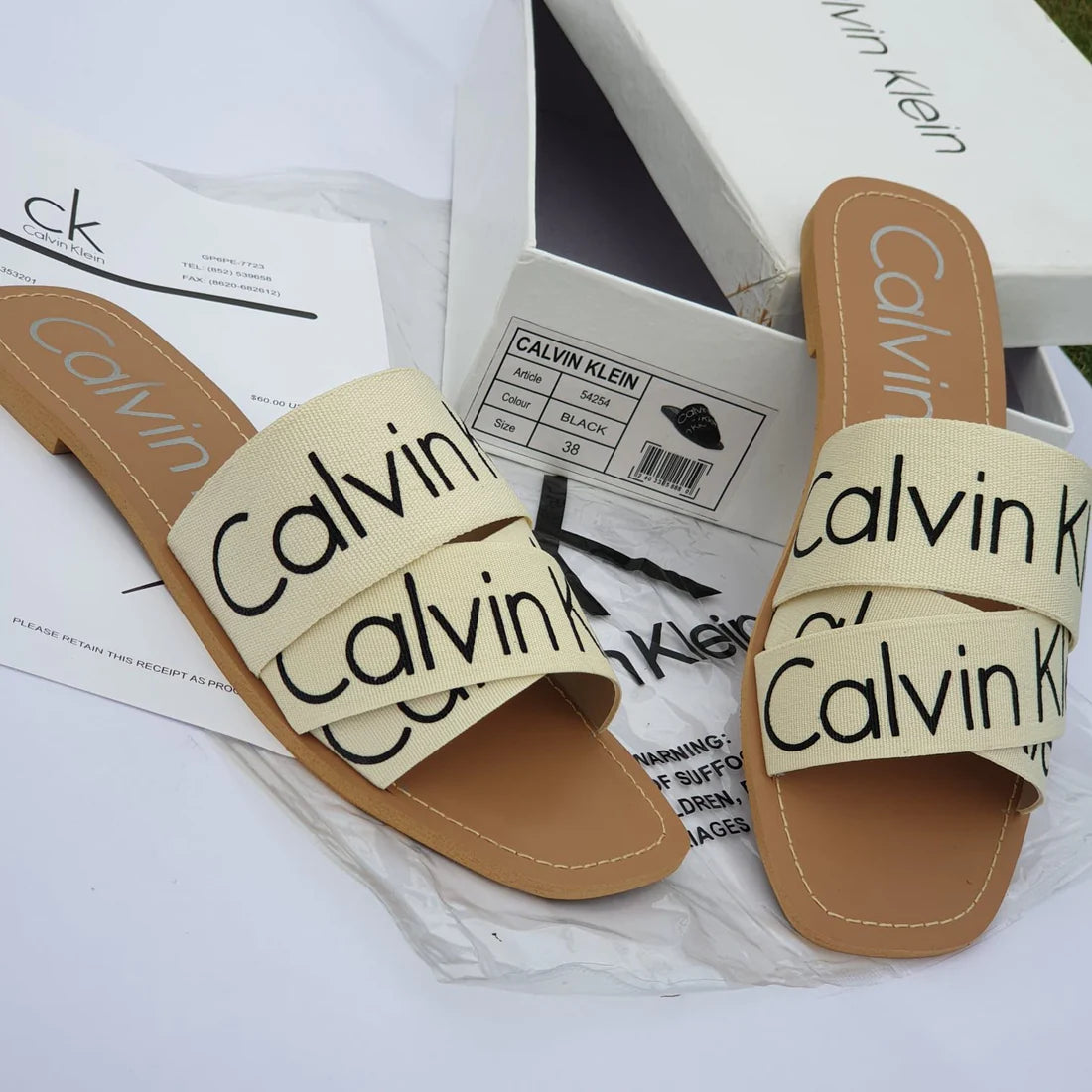 Calvin Klein Flat Slippers Women’s Footwear (Cream/Brown)