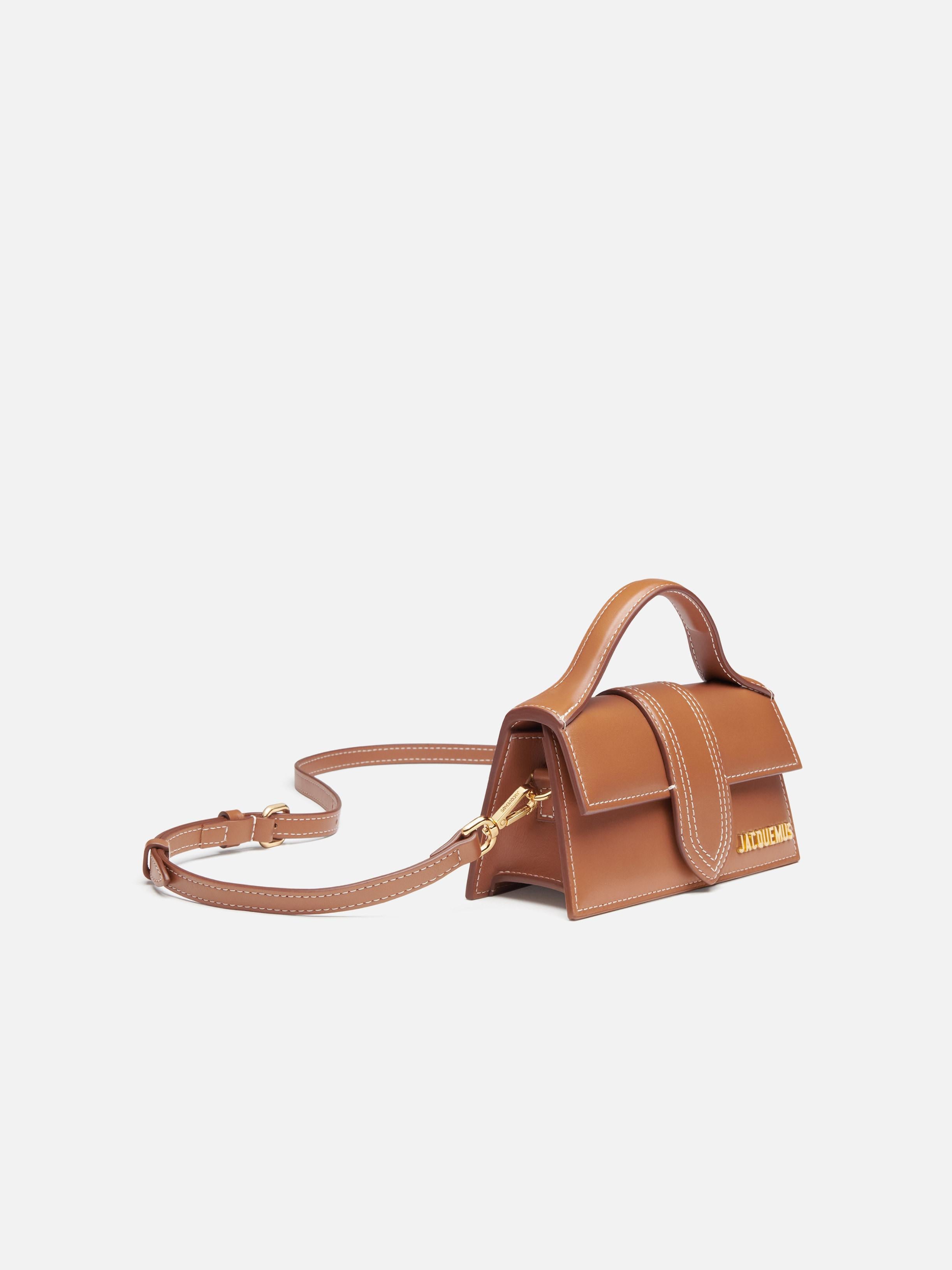 The Bambino Small handbag with adjustable crossbody strap.