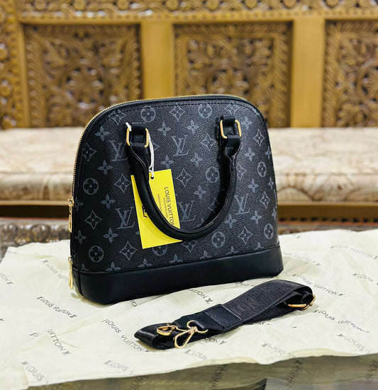 LOUIS VUITTON  Elite Monogram Handbag