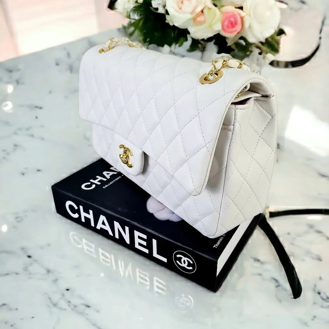 Chanel Jumbo Classic Double Flap Bag Lambskin White with front view showcasing luxury design and iconic hardware.