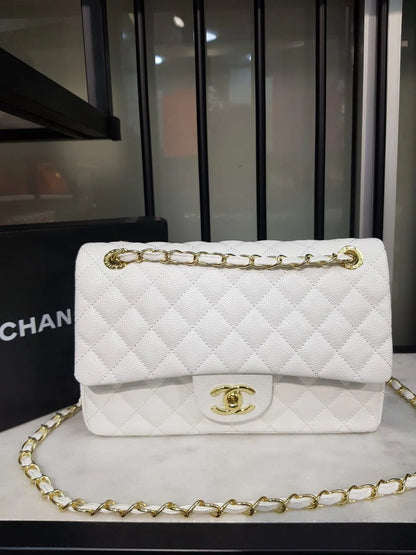 Chanel Jumbo Double Flap Bag Lambskin White from the side showing elegant design and premium craftsmanship in luxurious white leather.