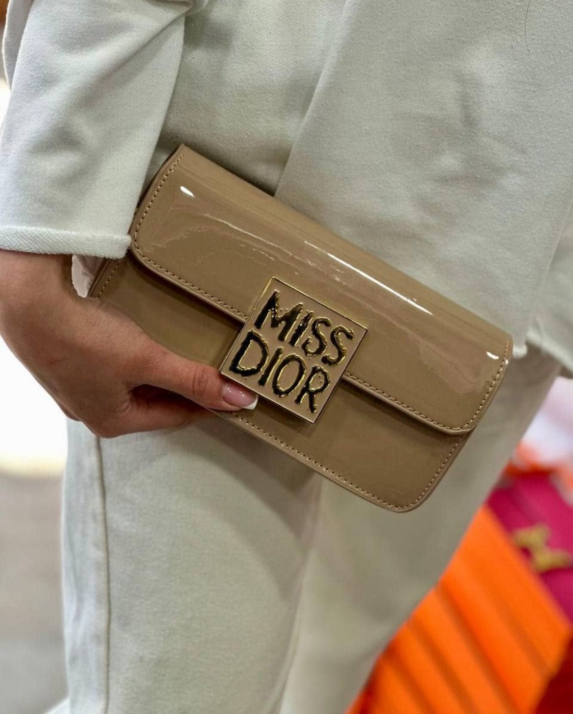 Interior view of Dior calfskin handbag – well-organized compartments with luxe lining and gold-tone zipper details.