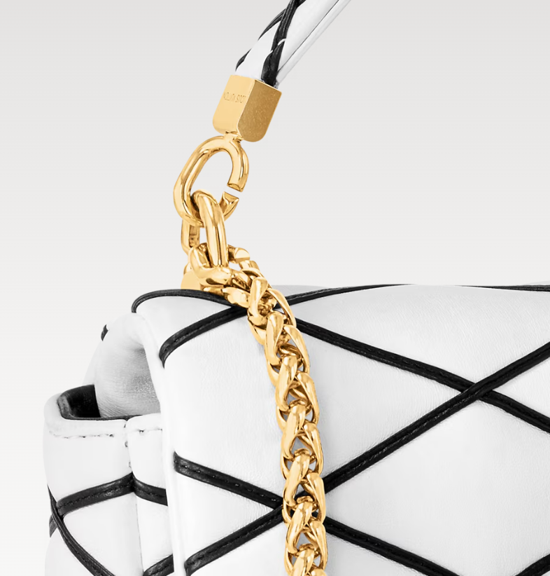 Top handle detail of Louis Vuitton GO-14 MM white/black handbag with gold-tone chain strap
