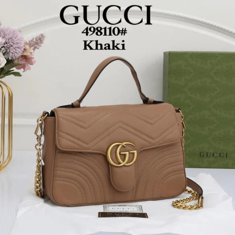 Gucci GG Marmont Khaki Handbag with Gold Logo – Chic Luxury Designer Bag for Women.