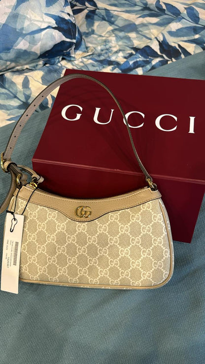 Gucci Luxe Stylish Handbag in beige, pink, and brown, front view showing elegant design and premium leather.