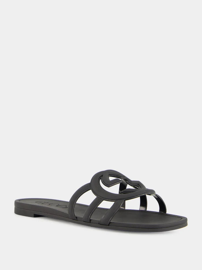Black Gucci Mystic slides styled by model – fashionable women's sandals perfect for streetwear and resort looks.