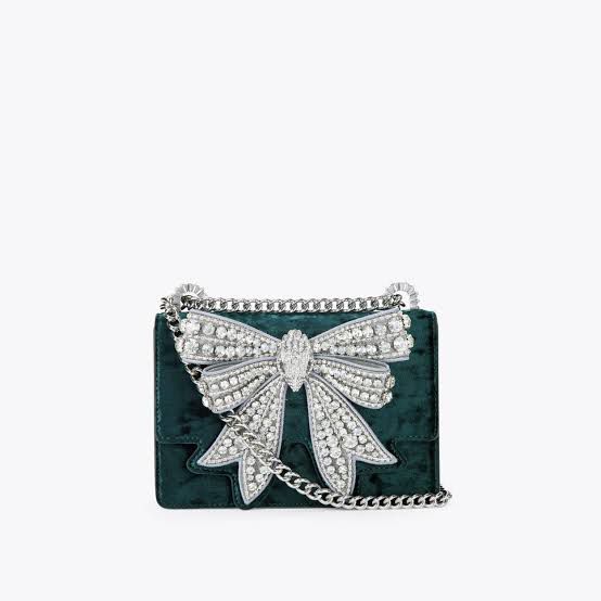 Kurt Geiger Small Shoreditch Bow Bag in green leather, a fashionable and versatile handbag for everyday use.