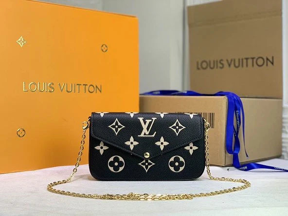 Front view of Louis Vuitton Félicie Pochette in black – elegant monogram-embossed clutch bag with envelope flap and sleek silhouette.