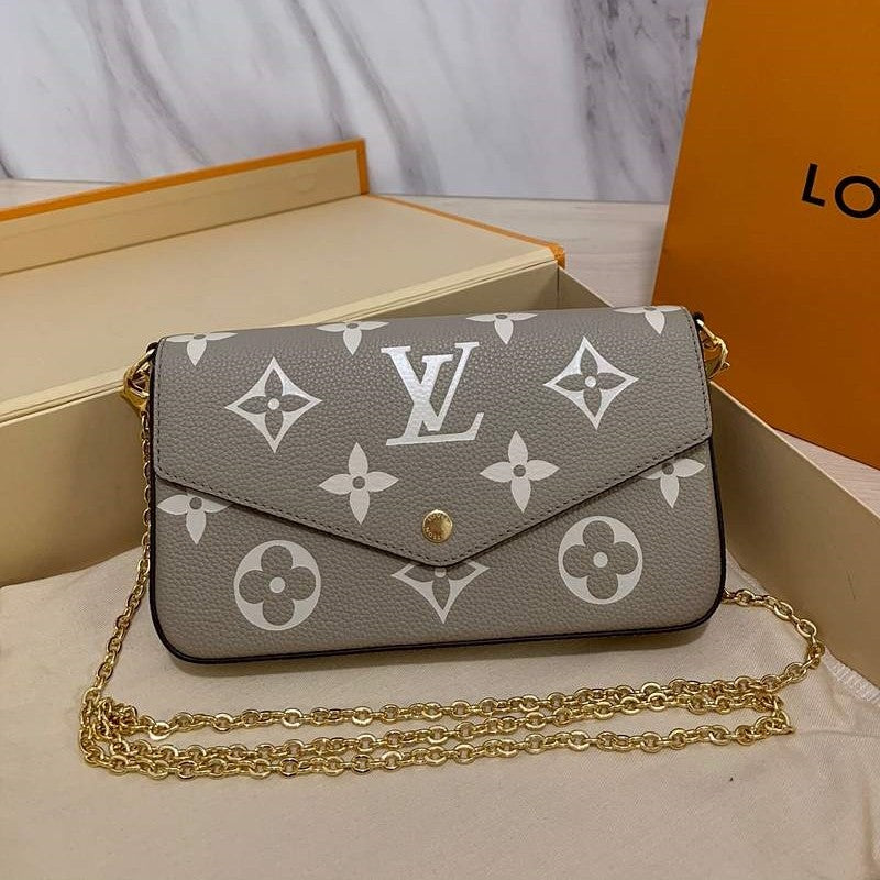 Front view of Louis Vuitton Félicie Pochette – elegant women’s clutch bag with signature monogram canvas and envelope flap.