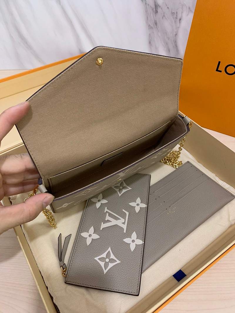 Front view of Louis Vuitton Félicie Pochette – elegant women’s clutch bag with signature monogram canvas and envelope flap.