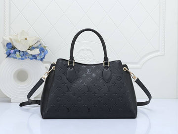 Classic black Louis Vuitton Vendôme MM handbag featuring structured silhouette and leather finish