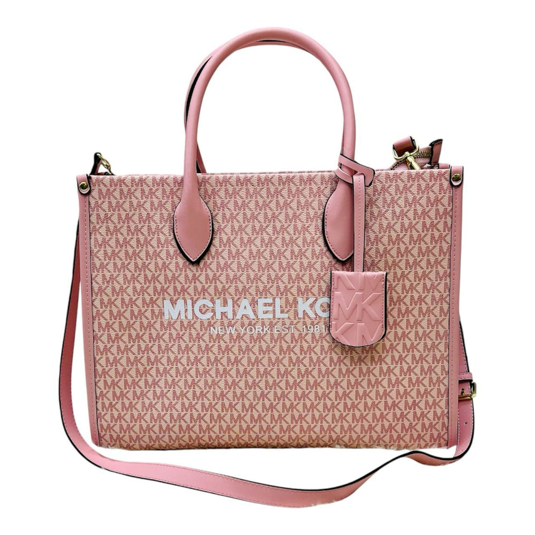 Collection of Michael Kors tote bags featuring signature designs and logo prints
