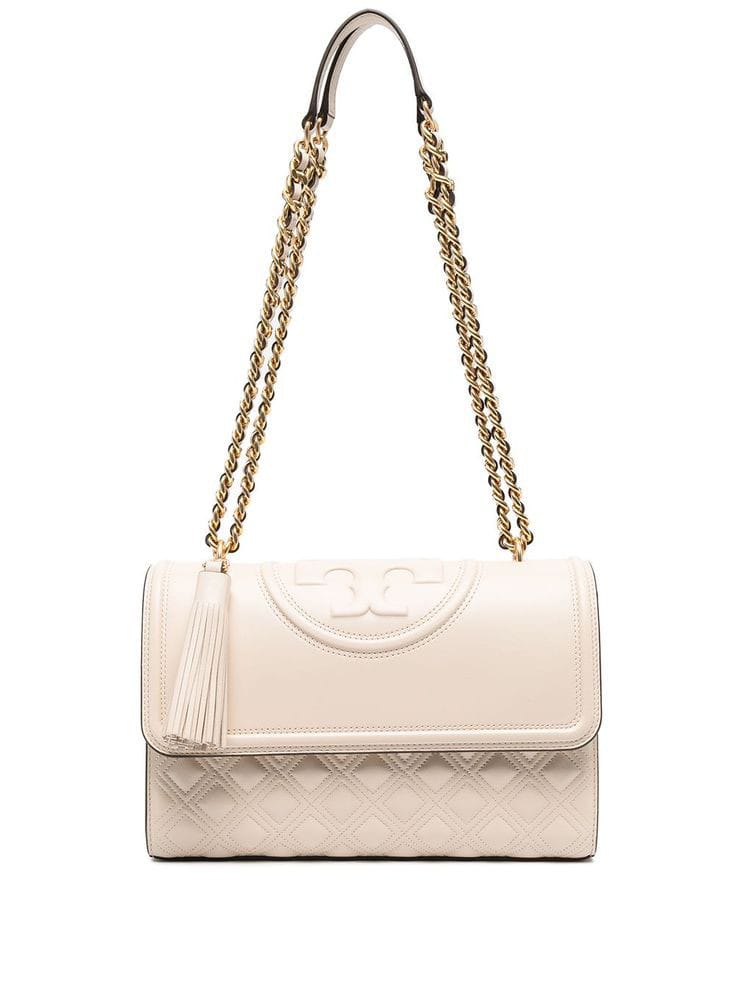 Side angle of Tory Burch Britten leather shoulder bag – elegant and adjustable handbag for women with gold hardware and structured shape.