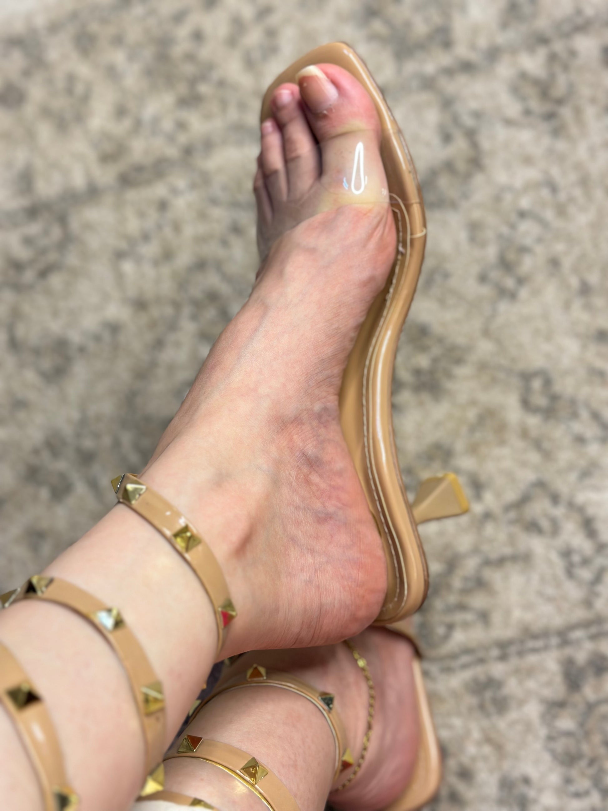 Embossed Valentino logo on insole of Rockstud lace-up heels – authentic designer branding for premium women’s footwear.