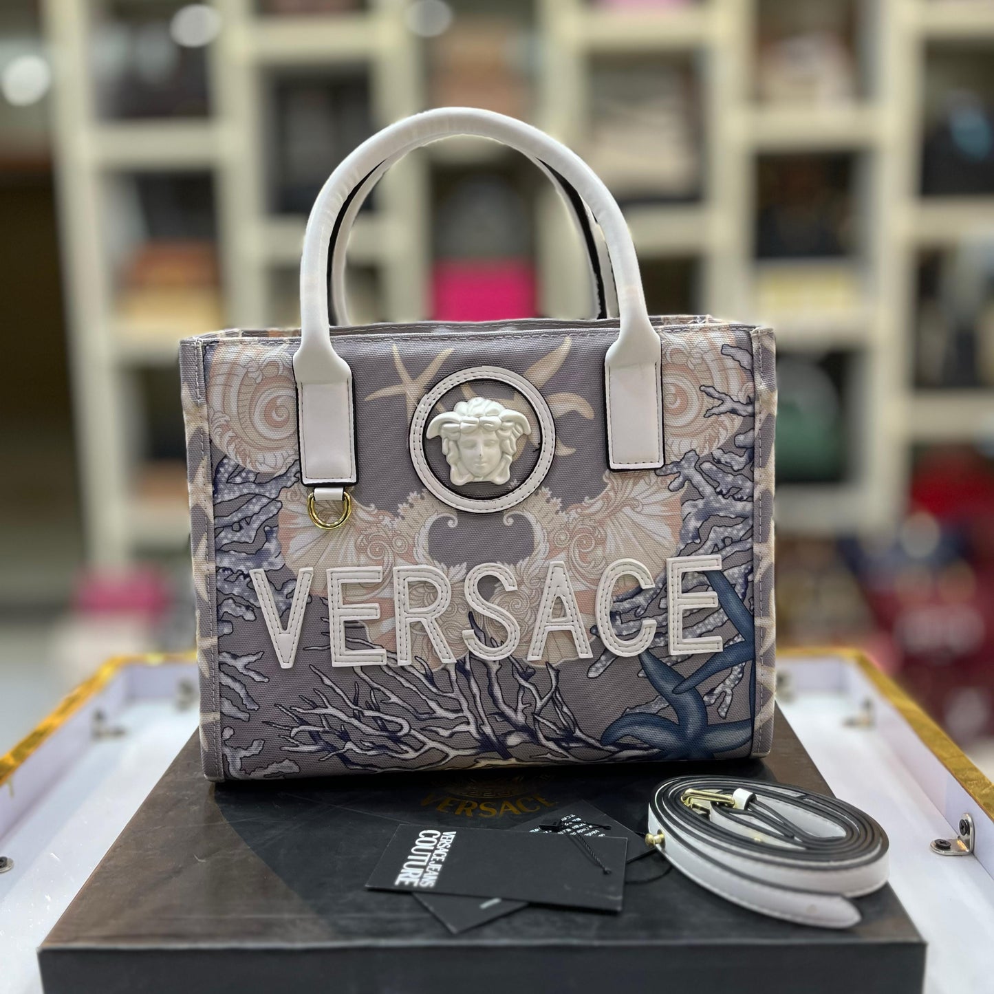 Close Image of the Versace Barocco Sea Canvas Tote Bag, focusing on the luxurious barocco pattern and canvas material.