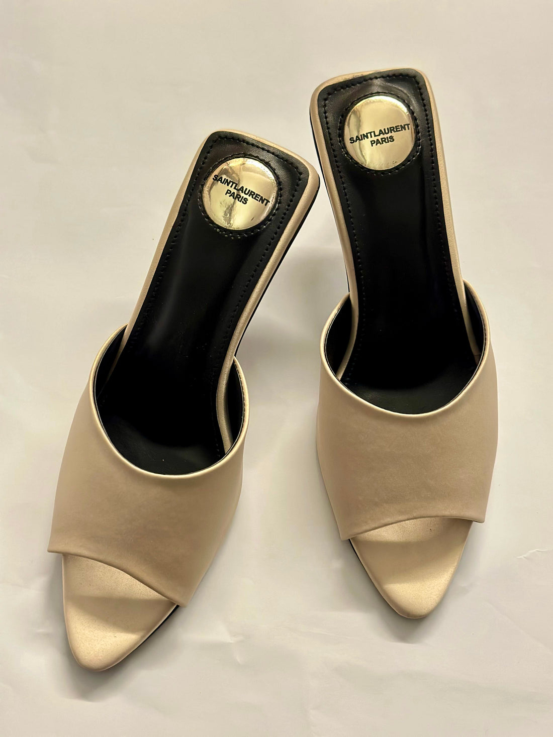 Front view of YSL Luxe Nude Slide Heels – elegant nude designer heels with minimalist leather strap and open toe.